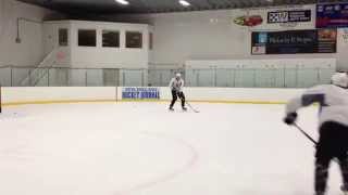 Milan Lucic passes to Seth Griffith in practice