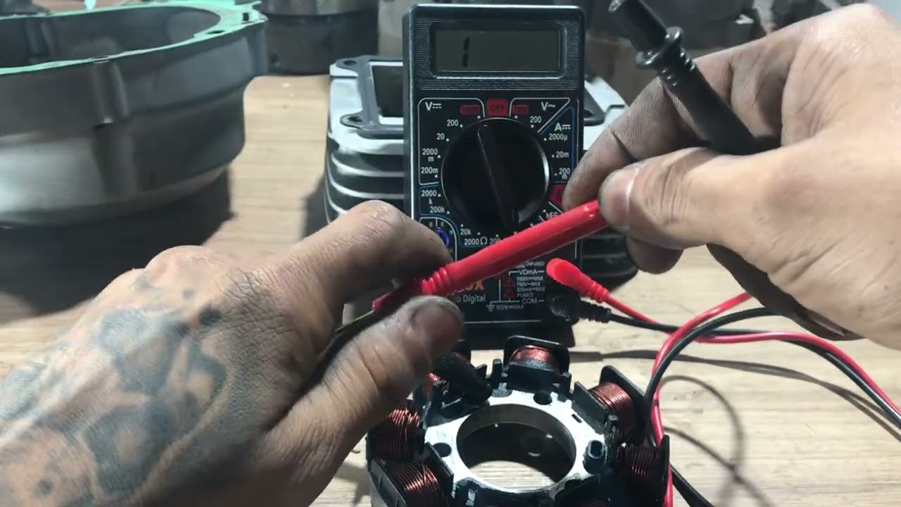 Como testar estator e bobina de pulso da ybr 125 2006 com um multímetro 