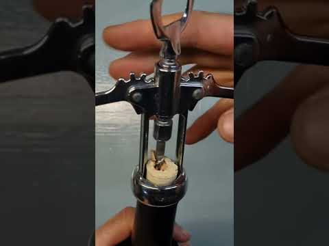 Comment Ouvrir Une Bouteille Avec Un Tire Bouchon à Levier