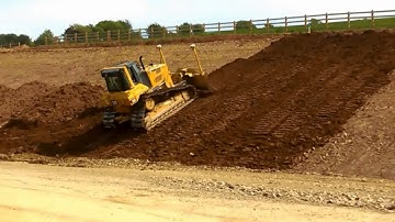CAT D6N LGP dozer with Trimble 3D GPS pushing topsoil