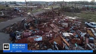 At least 26 killed as tornadoes sweep through 2 states