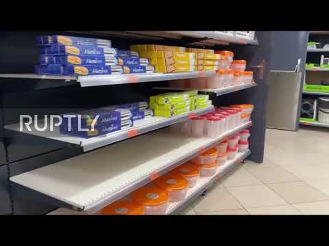 spain:-citizens-empty-madrid-supermarket-shelves-amid-coronavirus-fears
