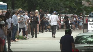 Georgia can ban giving food and water to voters in line this November, court rules