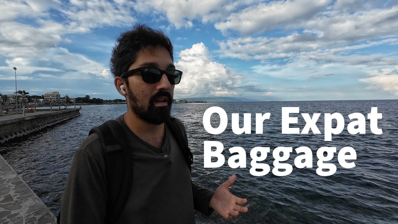 Play: Expats Dragging Their Baggage Overseas