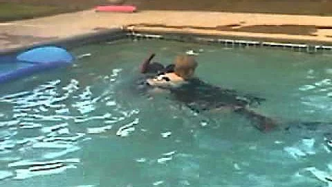 Micah "surping" (surfing) on grandpa.
