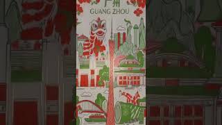广州主题手绘明信片。红绿配色清新明快，木棉花开热烈。汇聚广州塔、五羊石像、醒狮与中山纪念堂等地标，方寸间尽展羊城的历史底蕴与活力。