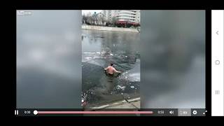 Dog Rescue - Russian Man Jumps in Icy River To Save Drowning Dog