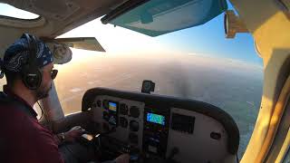 Cessna 172 landing at beautiful Sunset in California