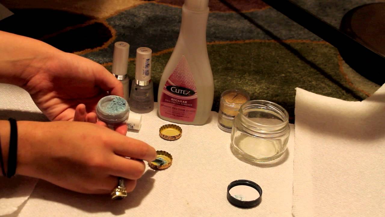 making nail polish design on coffee mugs