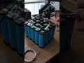 This is how the electrical connection process on several batteries is carried out by an expert.