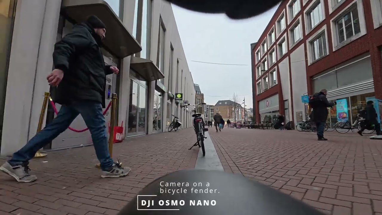Camera DJI on a bicycle fender.