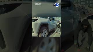 Thieves snatch purse from unsuspecting woman's car in Koreatown