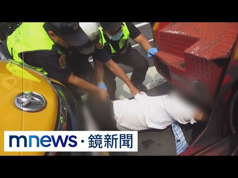 不滿遭拖吊　小黃運將躺地賴皮判拘役30天｜#鏡新聞