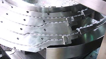 Caps assembly machine