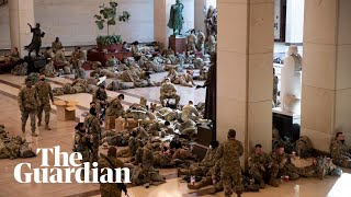 Hundreds of troops guarding US Capitol filmed resting during break in shifts