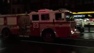 FDNY ENGINE 23 SPARE TAKING UP FROM EMS CALL ON 8TH AVENUE IN MIDTOWN, MANHATTAN IN NEW YORK CITY.