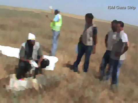 Recovering dead body under Israeli fire (version w...