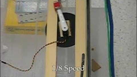 A dynamic single actuator vertical climbing robot