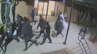 Hammers, pickaxes and spray paint: Masked group attacks DeKalb government building