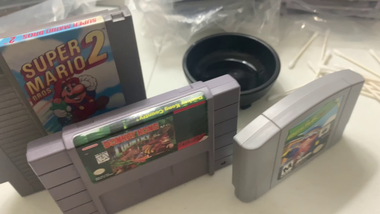 How to clean and unyellow retro game carts! NES, SNES, N64! - YouTube