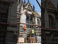 A forgotten 19th-century stone cathedral stands abandoned on a foggy hilltop in Northern Europe