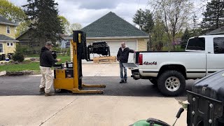 Garage is full. Big Joe forklift and other equipment. First test with big Joe.