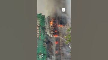 Four dead as fire rages through Hong Kong high-rise residential complex