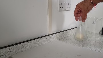 Using atmospheric pressure to push an egg into a conical flask