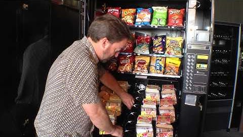 How to Put a Side Spacer into a Single Coil Snack Machine