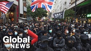 Hong Kong protesters take part in rally as government urges calm screenshot 5