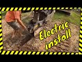 Using the custom built plow to install electric to new campsites and the water slide