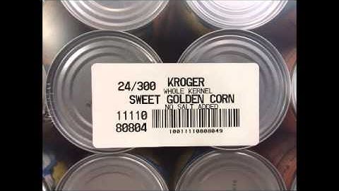 Wipe-On Label Printer Applicator on Multipacks of Cans on Trays
