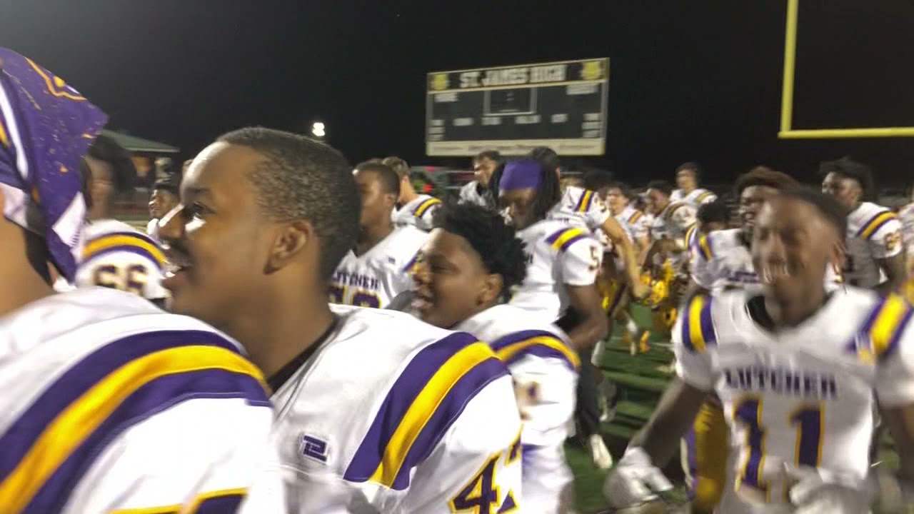 The Lutcher Bulldogs football team celebrates a victory vs. parish