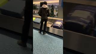 Piles of luggage at Vancouver airport as flights cancelled