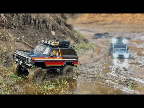 Traxxas TRX-4 Ford Bronco and Defender long muddy trail