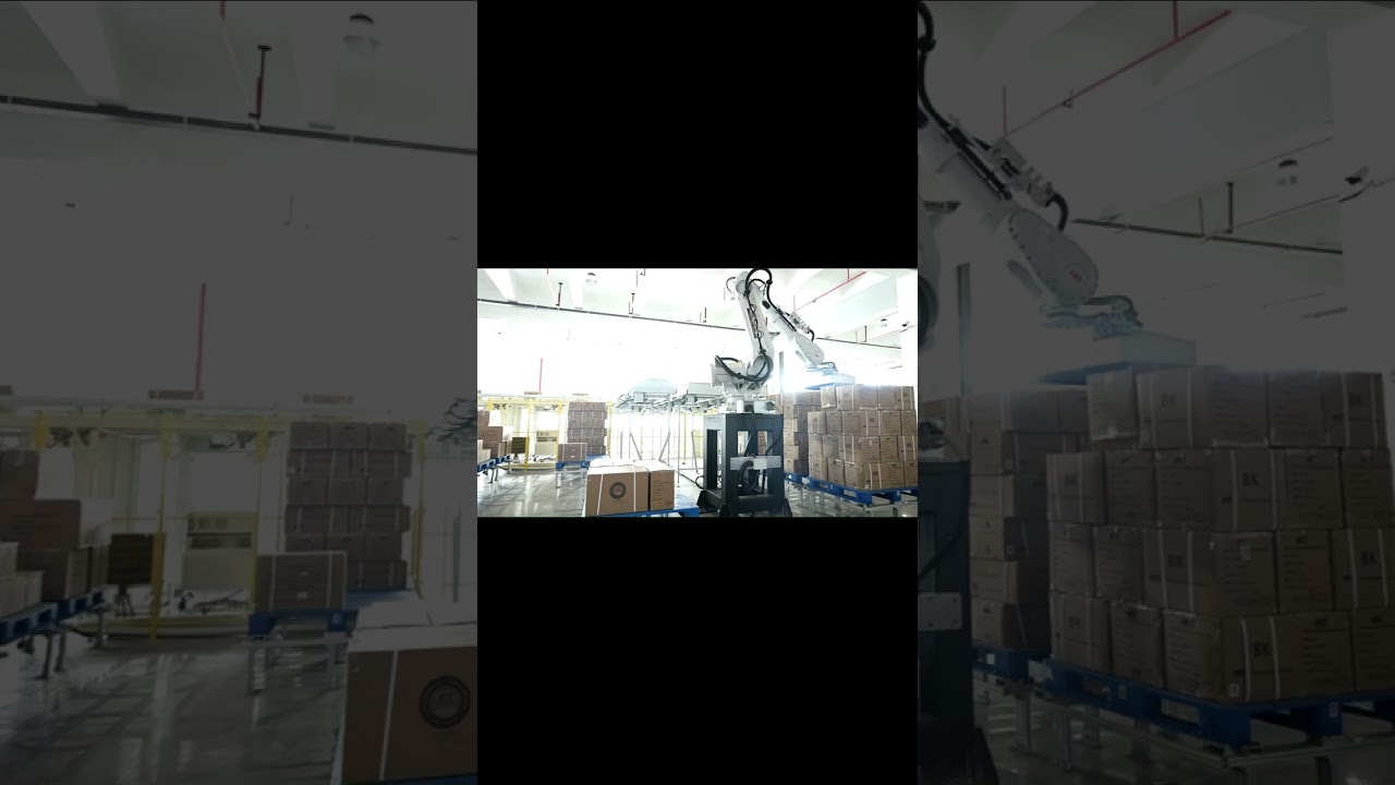 How MH Factory's 'Iron Arm' Robot Packs & Moves Goods 