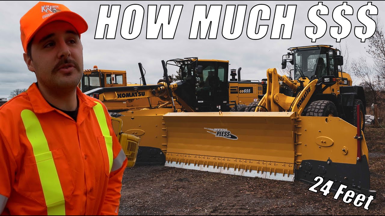 taking delivery of a massive snowplow blade (24 foot MetalPless Snow Blade)