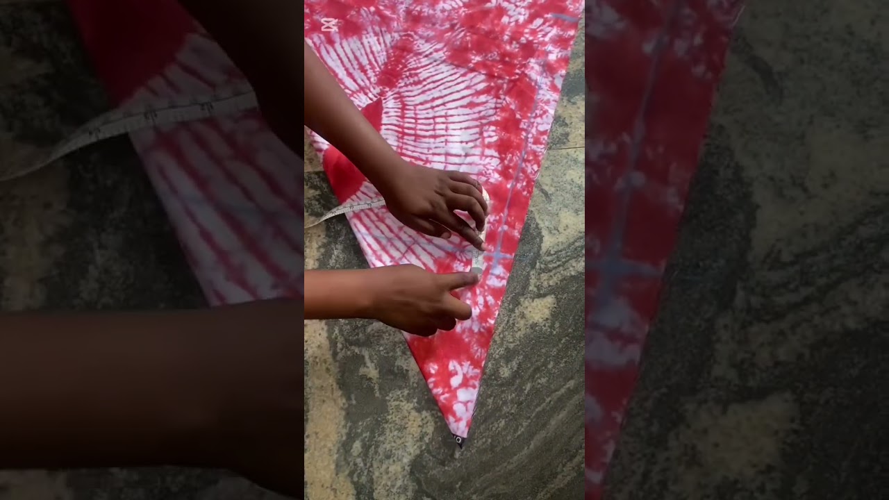 Cut this trendy backless flare Ankara gown with me in less than 3 minutes.