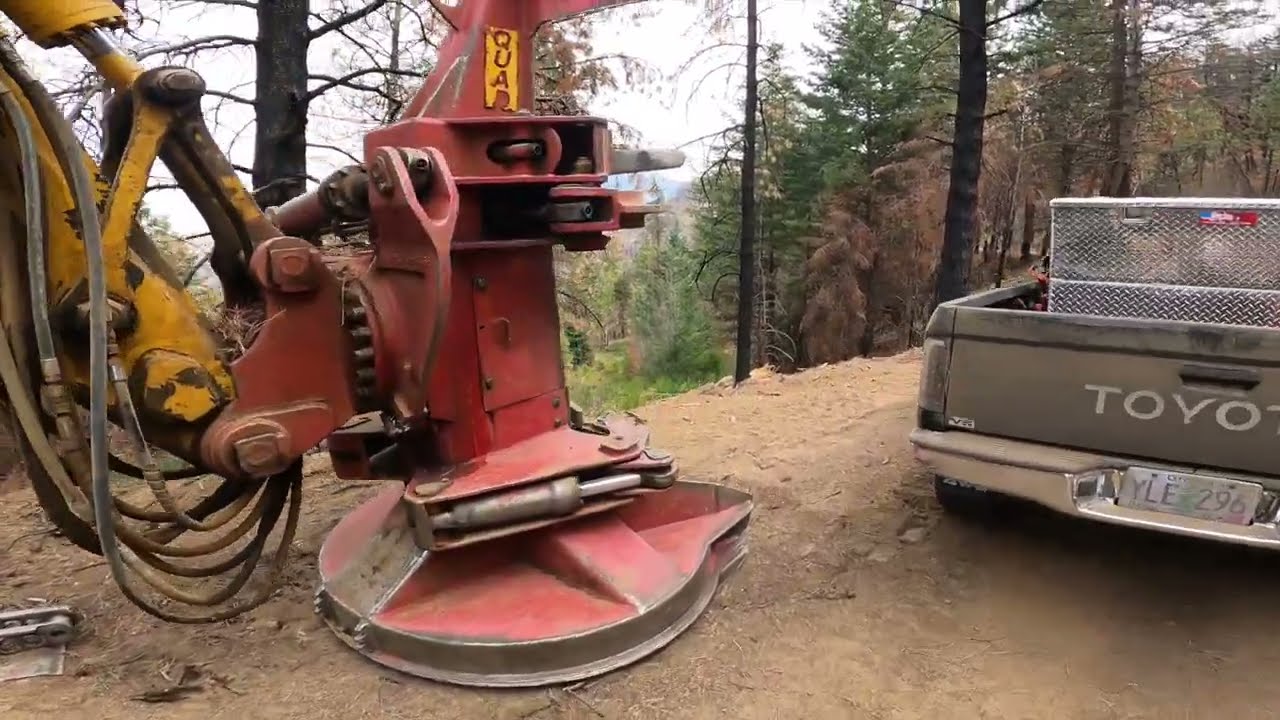 Changing jobs and making repairs on the feller buncher!