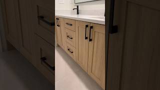Custom White Oak Double Vanity Paired with Black Hardware #bathroomremodel #bathroom #bathroomdesign