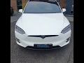 Model X90D White with Tan Leather Interior