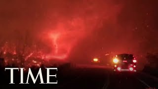 A fire tornado, for lack of better term, had just ripped through this
area northern california about mile and half away from downtown
redding, cit...