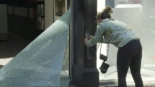 Images of damage and the clean up after protests in New York | AFP
