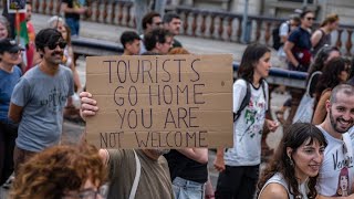 Beach Showdown: Locals vs. Tourists! Spain’s Summer Overtourism Drama