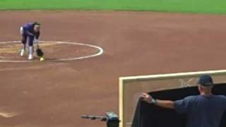 Danielle Lawrie breaks a pane of glass