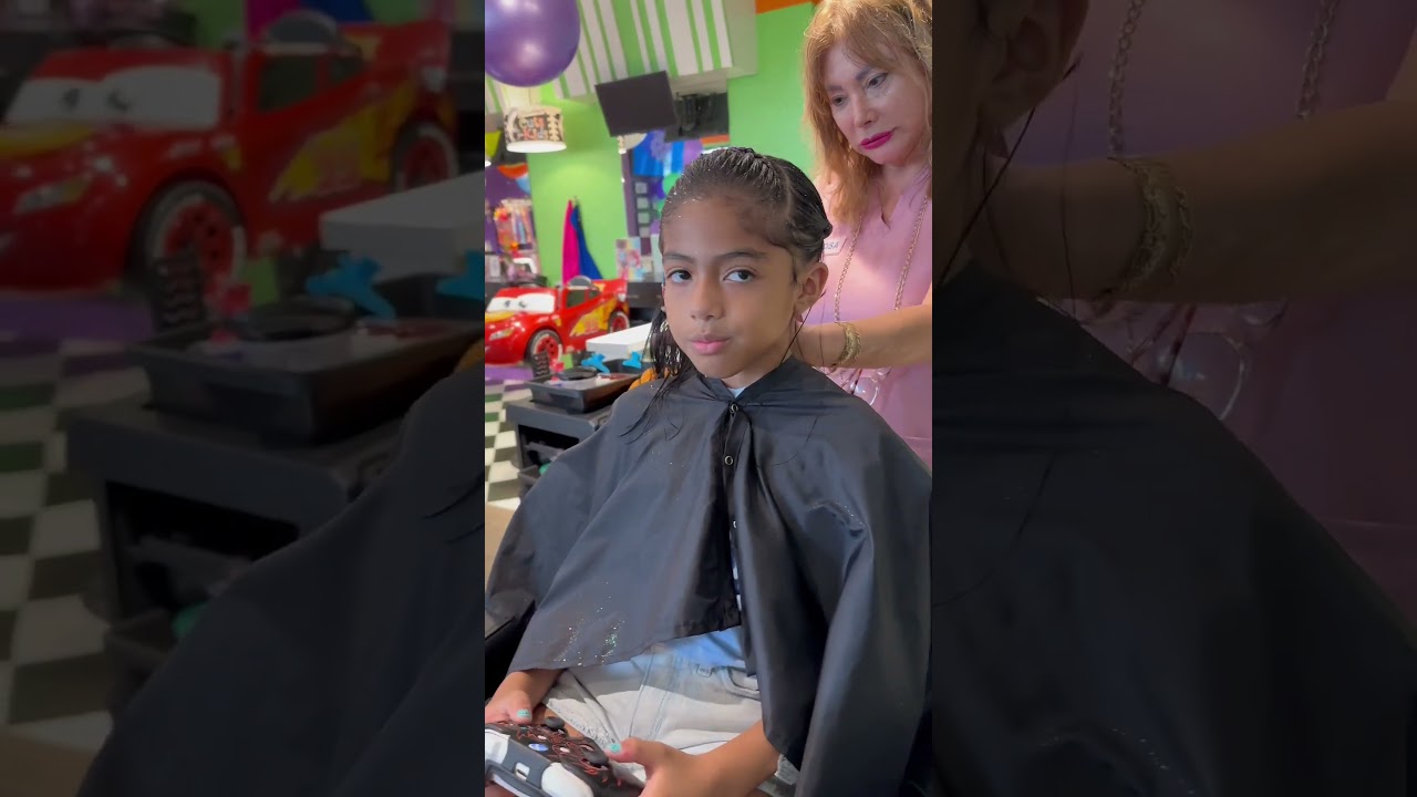 Getting my hair done at Sharkeys Cuts for Kids in Weston, FL!