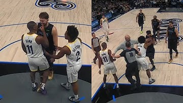 Luka Doncic gets a tech for laughing at Kris Dunn while he points in his face