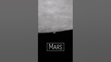 Mars Emerging from behind the Moon!