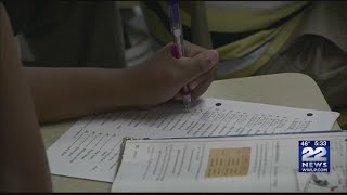 Full Gov. Charlie Baker signs bill, canceling this year's MCAS Guide