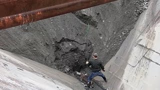 Barge unloading ore and river sand - relaxing video